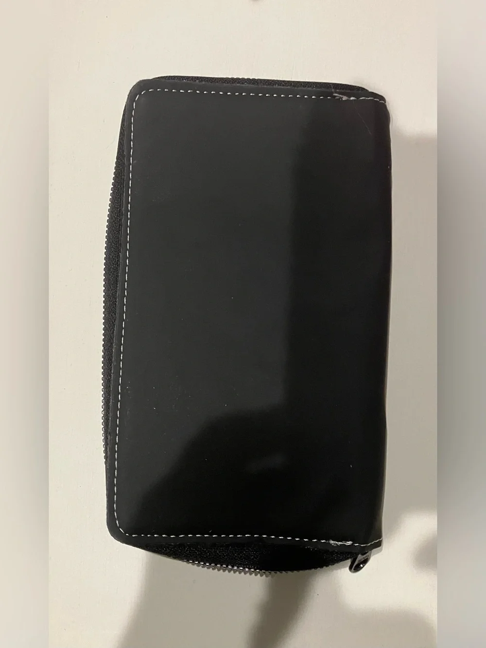Western-themed zip-around wallet cowboy riding horse sunset